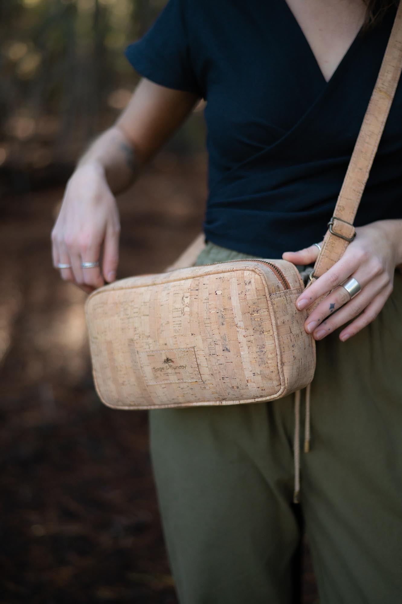 women wearing a cork leather moonbag and crossbody made by Sage & Sunday a cape town clothing brand