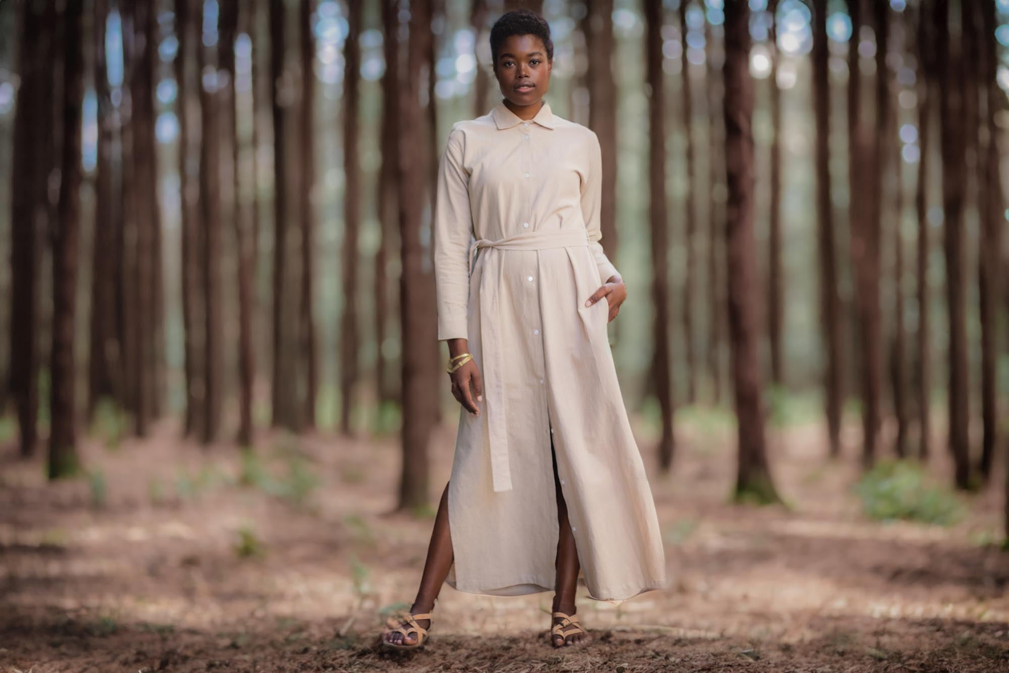 women wearing a beige hemp linen shirt dress made by Sage & Sunday a cape town clothing brand